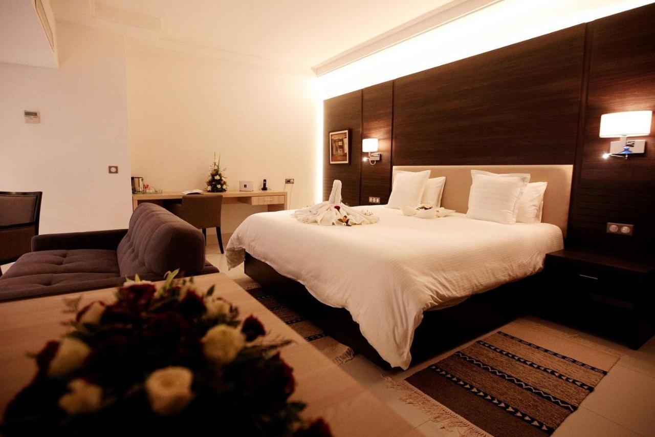 Radisson Hotel Sfax Exteriör bild A bedroom at the hotel