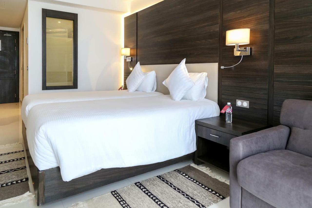 Radisson Hotel Sfax Exteriör bild A room at the hotel